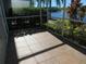 Spacious screened patio with tile floors and lake view at 7597 Plantation Cir # 7597, Bradenton, FL 34201