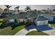 Luxury waterfront home with private dock and lush landscaping at 809 Lucia Dr, Punta Gorda, FL 33950