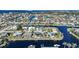 Aerial view of waterfront community with luxury homes and private docks at 809 Lucia Dr, Punta Gorda, FL 33950
