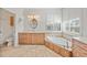 Spacious bathroom with soaking tub, double vanity, and large walk-in shower at 809 Lucia Dr, Punta Gorda, FL 33950