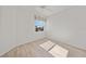 Bedroom with water view, ceiling fan, and laminate flooring at 809 Lucia Dr, Punta Gorda, FL 33950