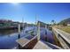 Private boat dock with lift and canal access at 809 Lucia Dr, Punta Gorda, FL 33950