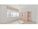 Bright dining room with chandelier and built-in hutch at 809 Lucia Dr, Punta Gorda, FL 33950