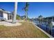 House exterior with canal side landscaping at 809 Lucia Dr, Punta Gorda, FL 33950
