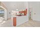 Open concept kitchen with stainless steel appliances and island at 809 Lucia Dr, Punta Gorda, FL 33950