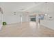 Open concept living room with access to the pool and kitchen at 809 Lucia Dr, Punta Gorda, FL 33950