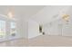 Bright and spacious living room with high ceilings and tile floors at 809 Lucia Dr, Punta Gorda, FL 33950