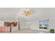 Spacious living room with kitchen and foyer views at 809 Lucia Dr, Punta Gorda, FL 33950