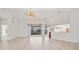 Open concept living area with pool access at 809 Lucia Dr, Punta Gorda, FL 33950