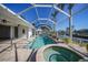 Spacious pool and spa with a screened enclosure at 809 Lucia Dr, Punta Gorda, FL 33950