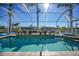 Screened pool and spa with tranquil water views at 809 Lucia Dr, Punta Gorda, FL 33950