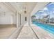 Inviting pool and spa area with lanai and water views at 809 Lucia Dr, Punta Gorda, FL 33950