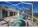 Large pool and spa with screened patio and canal views at 809 Lucia Dr, Punta Gorda, FL 33950