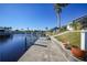 Steps leading down to private dock on canal at 809 Lucia Dr, Punta Gorda, FL 33950