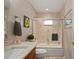 Updated bathroom with tub/shower combo and modern vanity at 831 Via Tunis, Punta Gorda, FL 33950