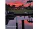 Scenic sunset view over the calm waters of a canal at 831 Via Tunis, Punta Gorda, FL 33950