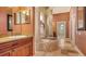 Elegant bathroom with a large soaking tub and separate shower at 108 Roselle Ct, Port Charlotte, FL 33952