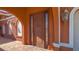 Ornate wooden door entryway with brick pavers and arched accents at 108 Roselle Ct, Port Charlotte, FL 33952