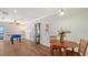 Game room with foosball table, hardwood floors, and access to balcony at 108 Roselle Ct, Port Charlotte, FL 33952