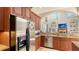 Modern kitchen featuring stainless steel appliances and ample cabinetry at 108 Roselle Ct, Port Charlotte, FL 33952