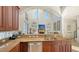Modern kitchen with granite countertops and stainless steel appliances at 108 Roselle Ct, Port Charlotte, FL 33952