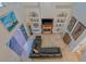 High-ceilinged living room with a fireplace and large windows at 108 Roselle Ct, Port Charlotte, FL 33952