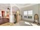 Main bedroom with hardwood floors and access to a private patio at 108 Roselle Ct, Port Charlotte, FL 33952