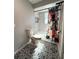 Clean bathroom with tub, shower, and patterned floor tiles at 1196 Hinton St, Port Charlotte, FL 33952