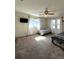 Spacious bedroom with two beds, ceiling fan, and ample natural light at 1196 Hinton St, Port Charlotte, FL 33952