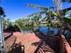 Relaxing canal-side deck perfect for enjoying Florida sunsets at 1196 Hinton St, Port Charlotte, FL 33952