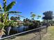 Waterfront property boasting a serene canal view at 1196 Hinton St, Port Charlotte, FL 33952
