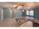 Open concept dining area with kitchen and wood beam at 1196 Hinton St, Port Charlotte, FL 33952
