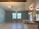 Spacious dining room with large windows and tile floors at 1196 Hinton St, Port Charlotte, FL 33952
