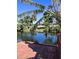 Wooden dock overlooking a serene canal at 1196 Hinton St, Port Charlotte, FL 33952