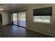 Gathering room with sliding doors to the patio and pool at 1196 Hinton St, Port Charlotte, FL 33952