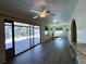 Gathering room with sliding doors leading to backyard patio at 1196 Hinton St, Port Charlotte, FL 33952