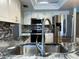 Updated kitchen with stainless steel appliances and granite sink at 1196 Hinton St, Port Charlotte, FL 33952