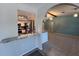 Kitchen features granite countertops and a breakfast bar at 1196 Hinton St, Port Charlotte, FL 33952
