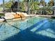 Relaxing swimming pool with stone waterfall at 1196 Hinton St, Port Charlotte, FL 33952