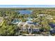 Aerial view of community clubhouse and pool area at 12682 Shimmering Oak Cir, Venice, FL 34293