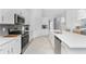 Sleek kitchen featuring a large island and modern finishes at 14281 Heritage Landing Blvd # 1425, Punta Gorda, FL 33955