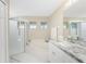 Bathroom with soaking tub and walk-in shower at 17513 Pomegrante Way, Punta Gorda, FL 33955