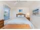 Bedroom with queen bed and neutral decor at 17513 Pomegrante Way, Punta Gorda, FL 33955