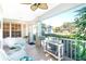 Bright and airy front porch with seating and natural light at 17513 Pomegrante Way, Punta Gorda, FL 33955