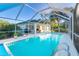 Refreshing screened pool area with plenty of space for lounging at 17513 Pomegrante Way, Punta Gorda, FL 33955