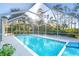 Inviting screened pool with ample deck space at 17513 Pomegrante Way, Punta Gorda, FL 33955