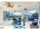 Relaxing screened lanai with comfortable seating overlooking the pool at 17513 Pomegrante Way, Punta Gorda, FL 33955