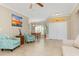 Living room with coastal decor and a view of the dining area at 1762 Foxglove Ave, North Port, FL 34288