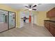 Dining area with wood cabinets and access to the kitchen at 18146 Grace Ave, Port Charlotte, FL 33948