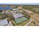 Aerial view of tennis courts and community clubhouse at 1849 Bobcat Trl, North Port, FL 34288